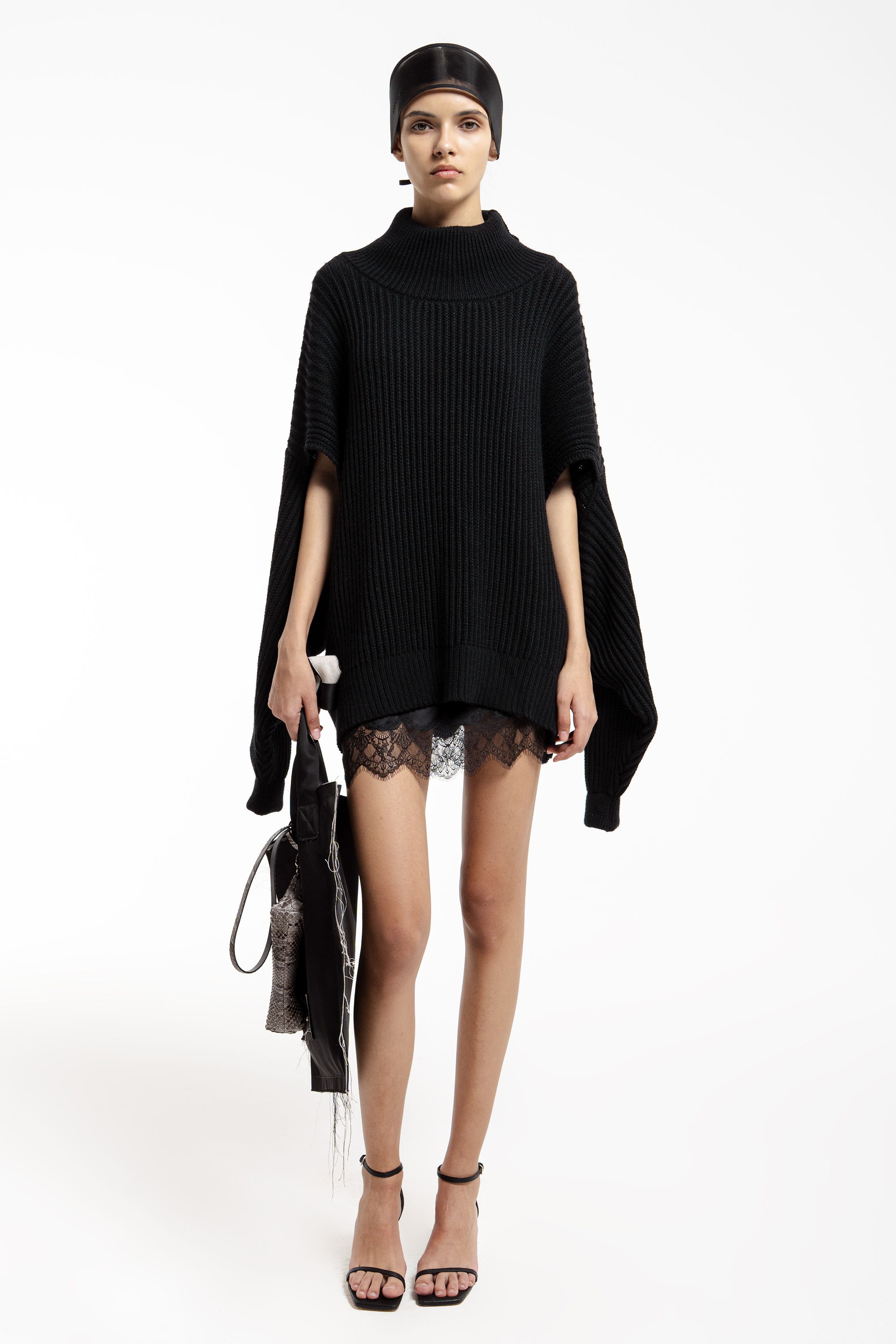 Sweater with cutouts on the sleeves