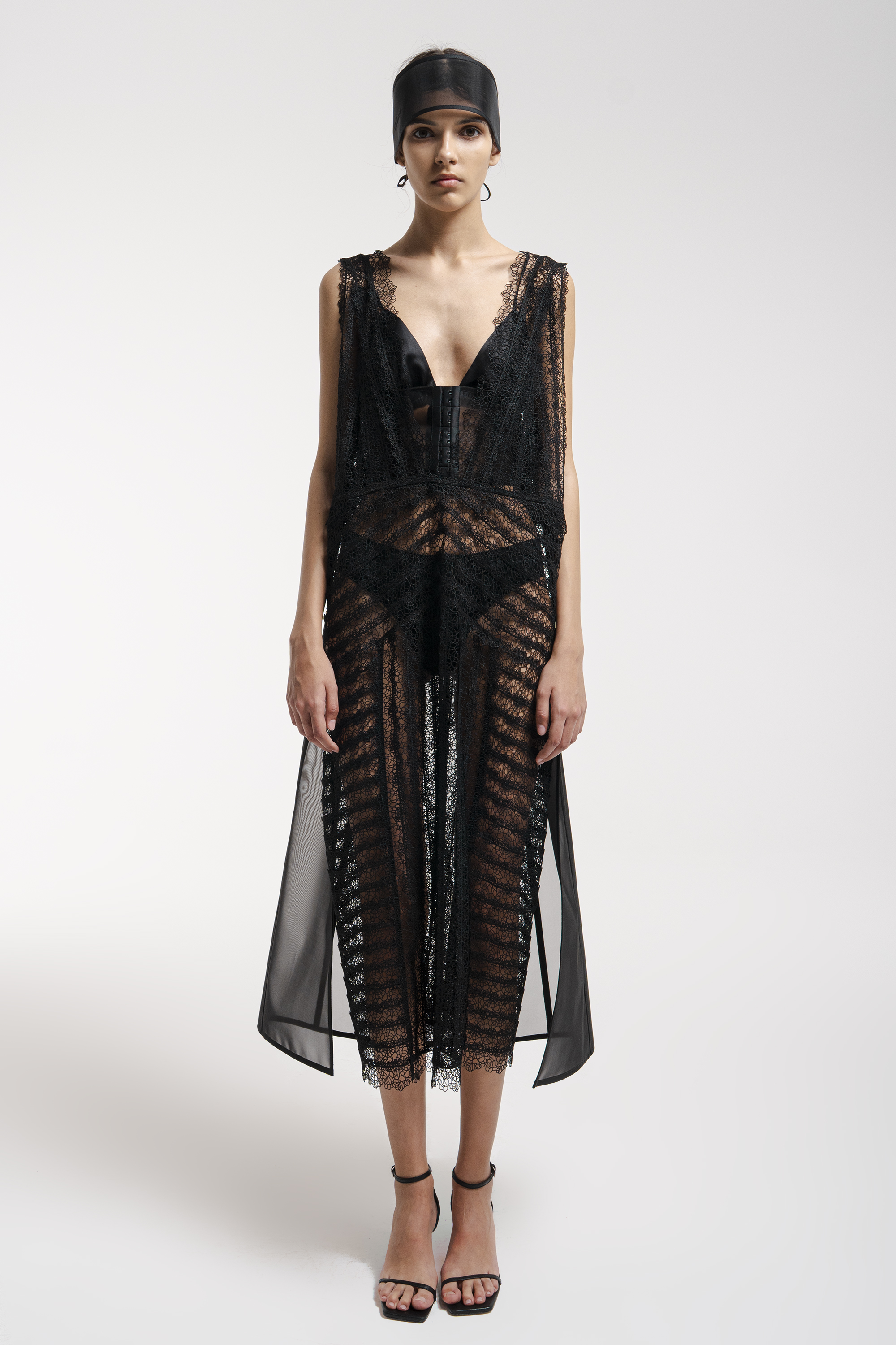 Lace dress with a decorative belt